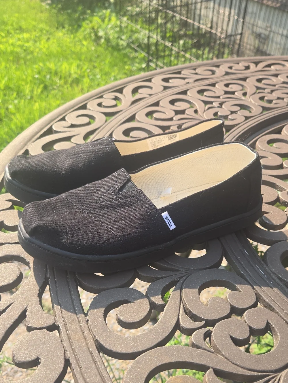 TOMS Women's Black Canvas Slip-On Moccasins